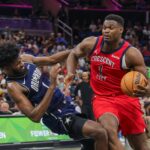 New Orleans Pelicans forward Zion Williamson (1) is fouled by Orlando Magic forward Jonathan Isaac (1) during the second half at KIA Center.