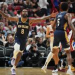 New Orleans Pelicans forward Naji Marshall (8) celebrates a shot against the Miami Heat during the second half at Kaseya Center.